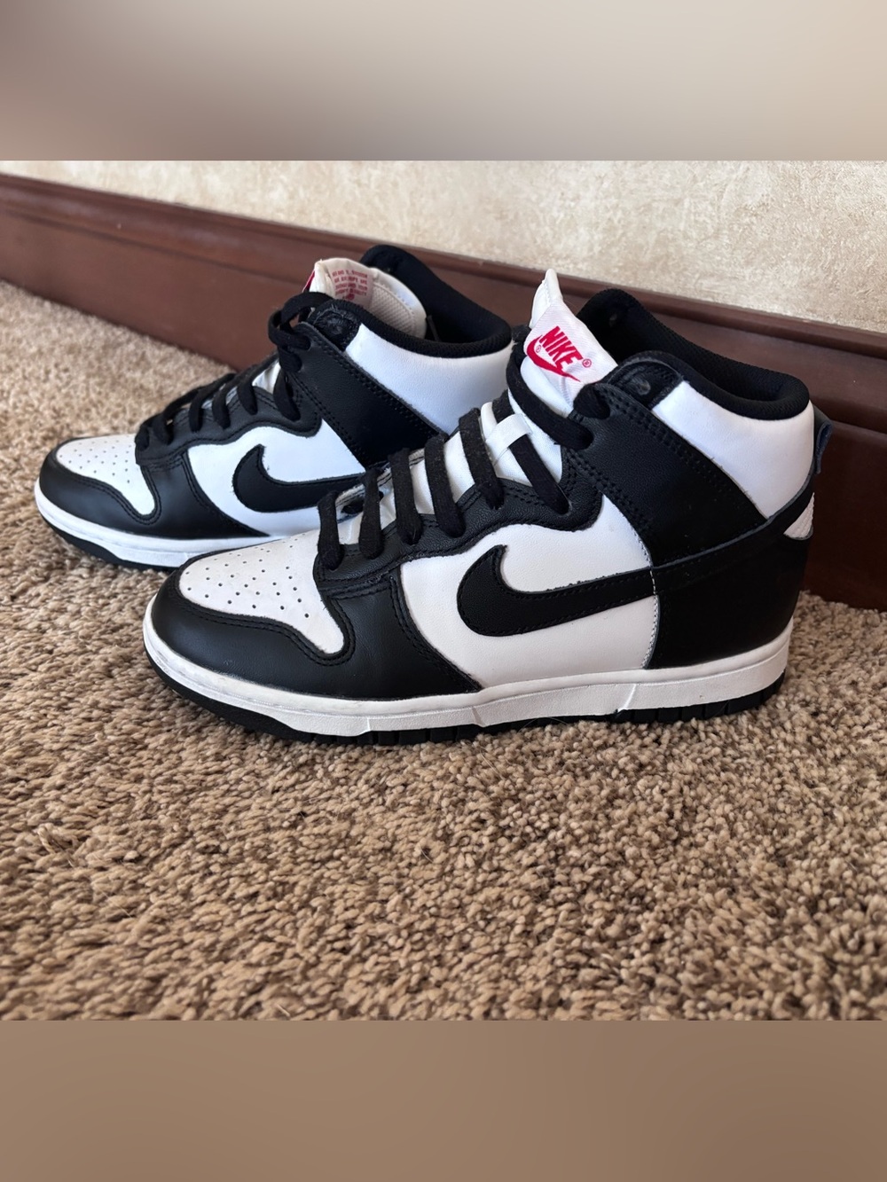 Like new! Nike Black and White High-Top Sneakers with Red Tongue Logo